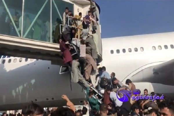 Chaos at Kabul airport as US troops fire